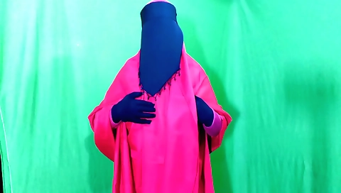 Indian Muslim housewife in a beautiful dress enjoys licking