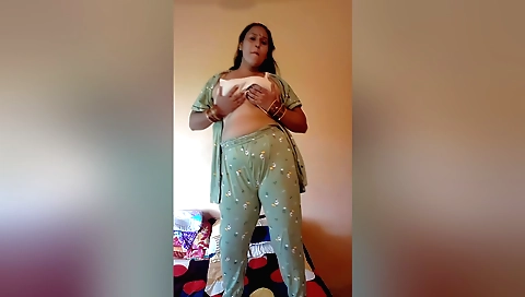 Puja baby dances on the floor with her legs spread open