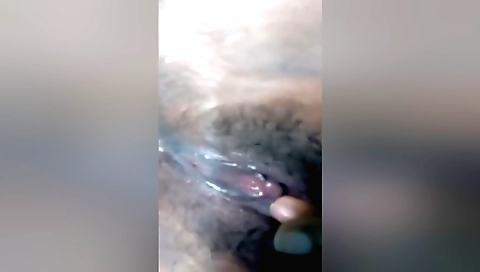 Hairy brunette with hot skin and beautiful tits is fingering