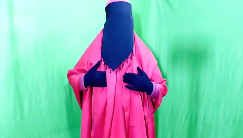 Indian girl with short hair enjoys watching her phone