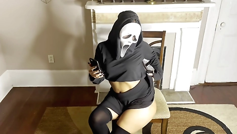 Indian girl in stockings and a ghost face in solo video