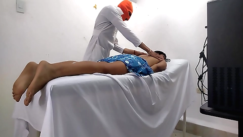 Indian brunette masseuse with a nice body gives a massage