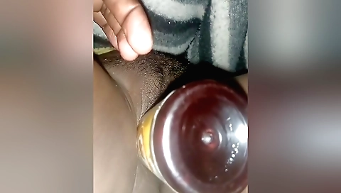 Hairy babe rides dildo and masturbates at the same time