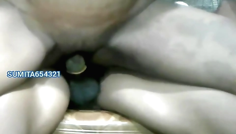 Indian girl with beautiful hair is sitting on the webcam