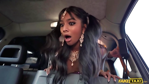 Indian chick makes out with a horny dude in a video