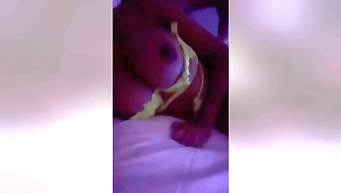 Amateur brunette beauty with big breasts showing off her body