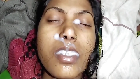 Brunette beauty takes a facial and gets cum in her mouth