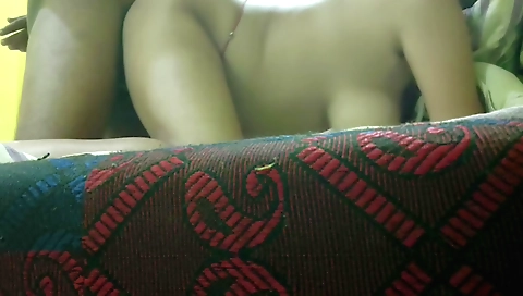 Indian teen in black dress is getting off on his bed