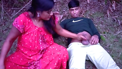 Indian babe is giving the best handjob in the jungle