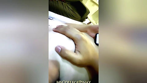 My body is stretched out on a massage table in amateur video