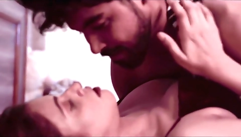 Old and young man with big booty is selling clothes to redhead