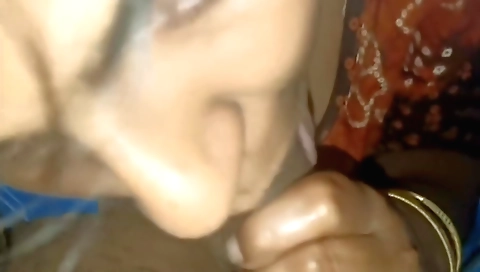 Amateur wife enjoys oral sex with husband in the living room