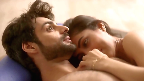 A brunette milf gets naked to show off her tits and body