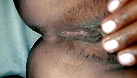 Indian girl fingers her cute hairy pussy in solo video