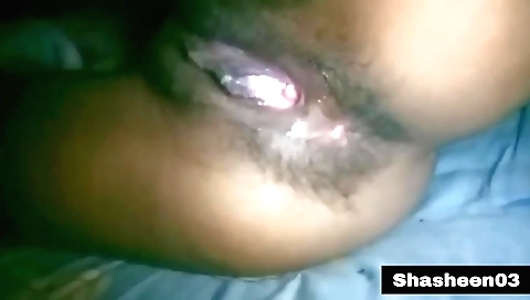 Asian brunette girl with a hairy cunt enjoys herself