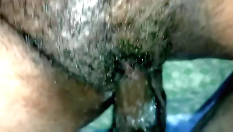 Hairy indian girl fucks herself in this porn video