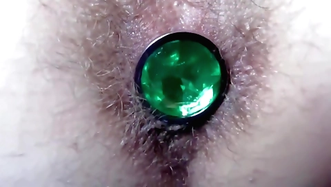 Amateur solo girl gets a butt plug in her tight ass